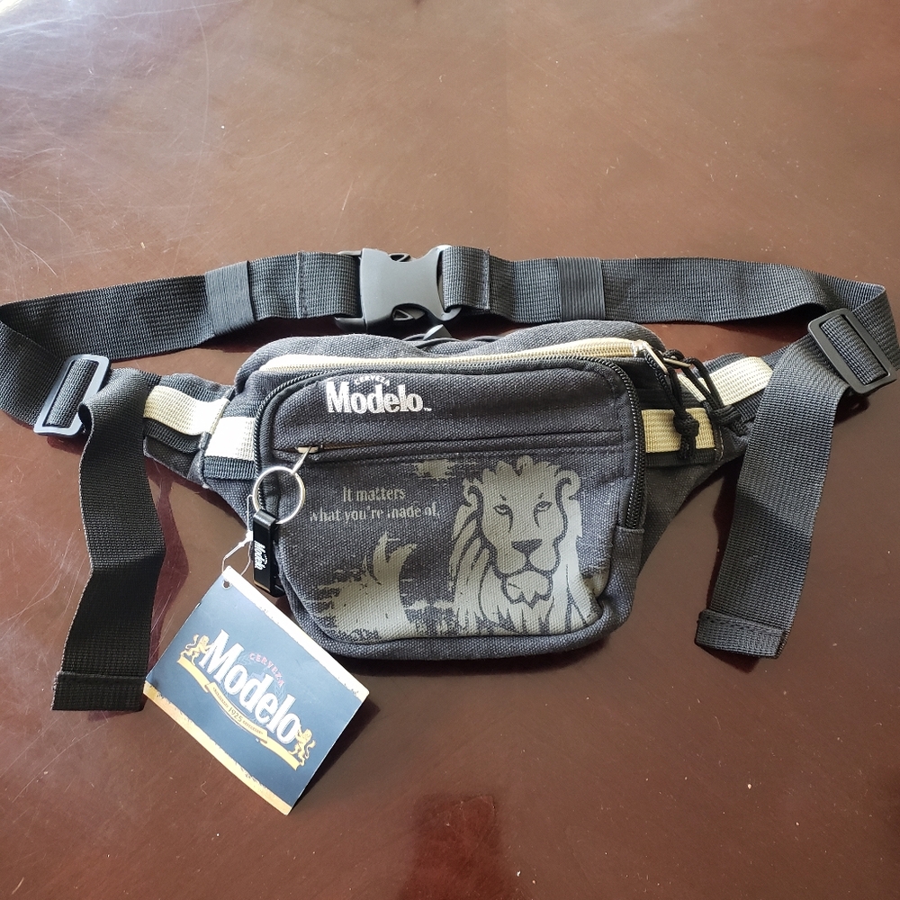 NWT Modelo black fanny pack with bottle opener as a zipper
